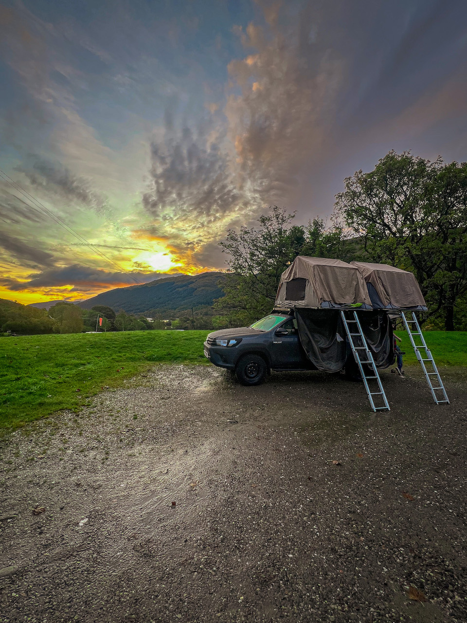 Truck with Rooftop Tents at Sunrise